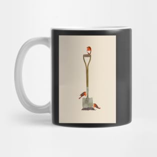 Three little robins on a garden spade Mug